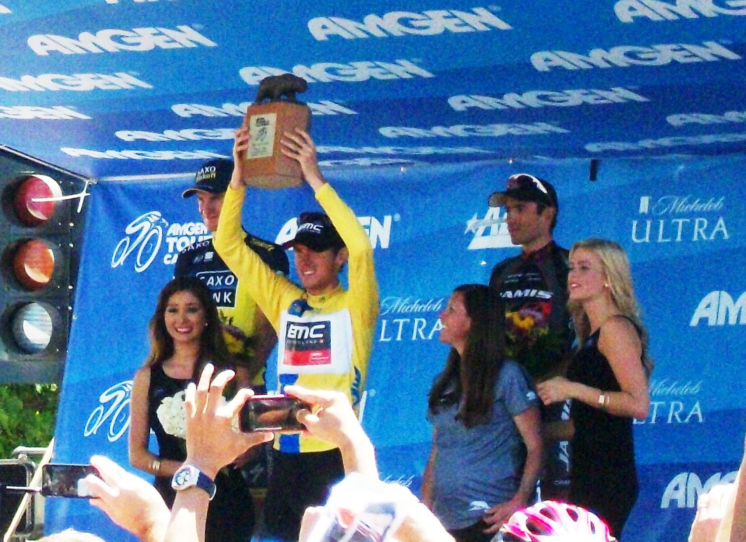 Tejay van Garderen holds up the AMGEN Tour of California Trophy.