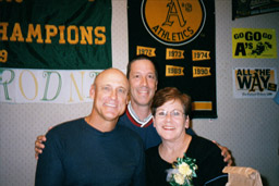 ART HOWE, Manager, DAVE and ART's wife BETTY at a Booster Club luncheon