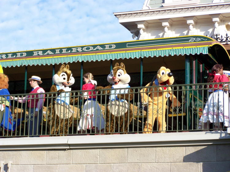 We watched the characters arrive by train to officially open the park for the day.