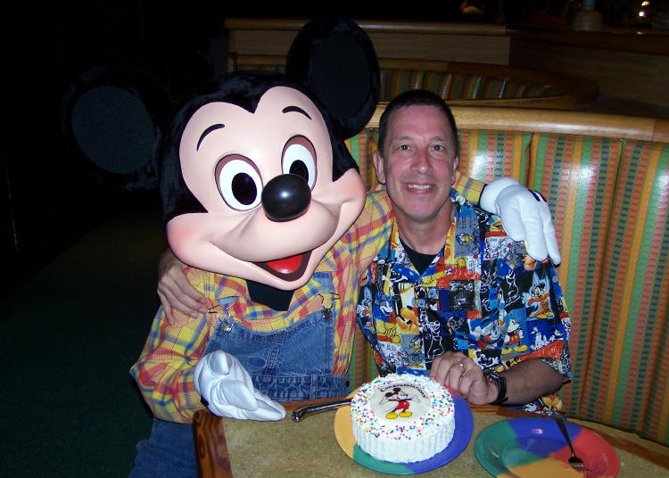 Micky gives Dave the birthday cake