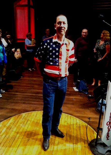 Dave standing on the circle of wood that was taken from the original Grand Ol Opry.