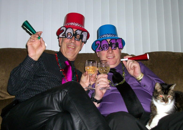 Dennis and I celebrate New Years Eve 2011 with Beethoven on Dennis' lap.  Beethoven took the fear of cats away from Dennis due to a bad experience Dennis had with a cat at a young age.  Beethoven was very special to Dennis