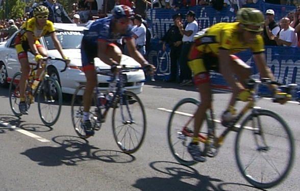 GEORGE HINCAPIE, U.S. Postal Team (center) riding between Saturn Riders MICHAEL BARRY and TRENT KLASNA.