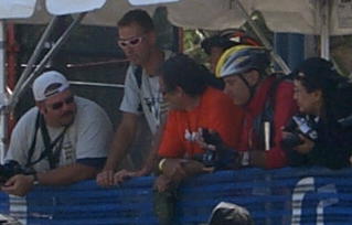 Comedian ROBIN WILLIAMS (wearing orange shirt).