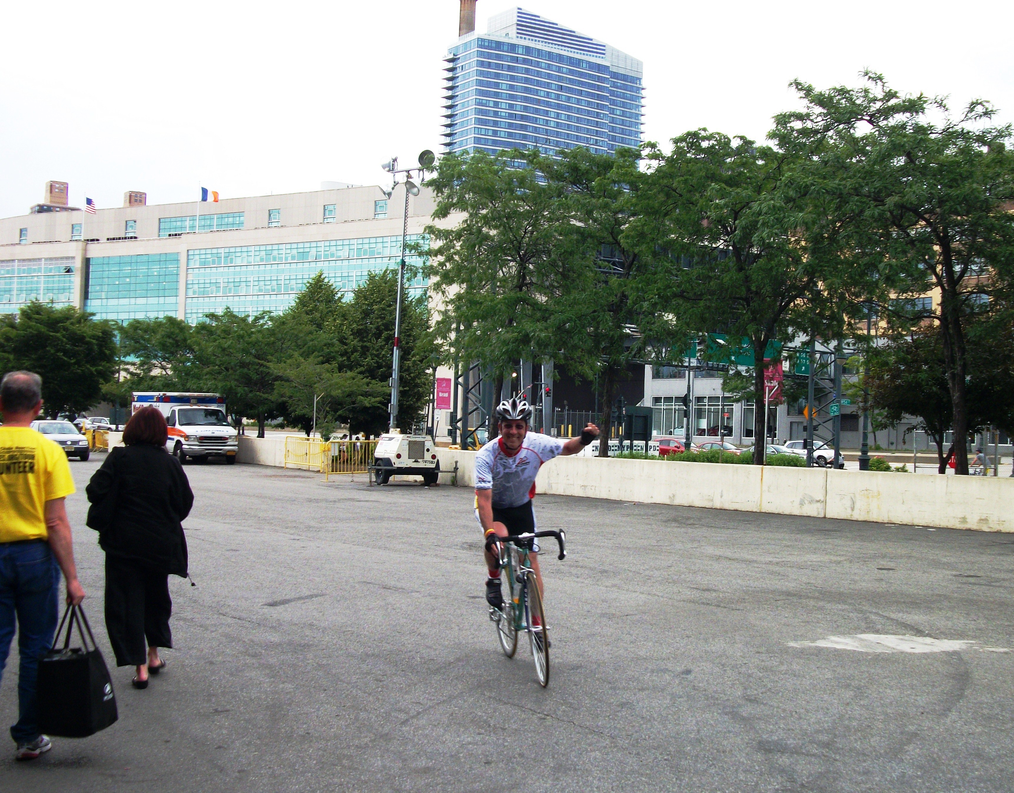 I raise my fists happy to arrive and finish the ride at Pier 94