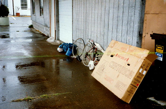 Unpacking the bicycle and gear on the first day.