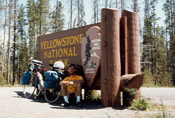 Posing in front of the sign at the entrace to Yellowstone National Park.