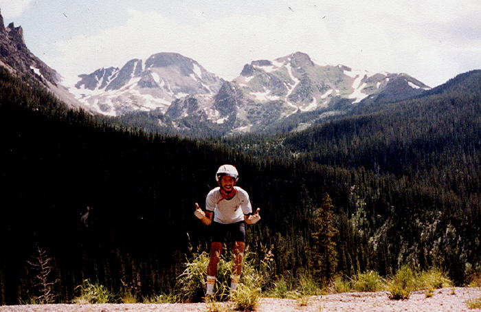 I'm excited to be near the top of Cameron Pass. The Rockies shown in the background.