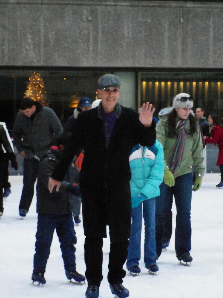 Dave on the skates waving at the camera