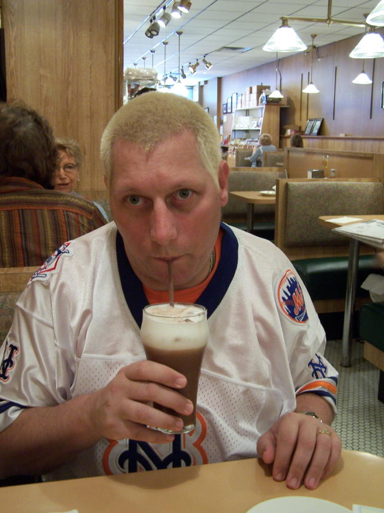 Dennis and his chocolate egg cream drink at Hinsch Restuarant.  A favorite place during Dennis' childhood.