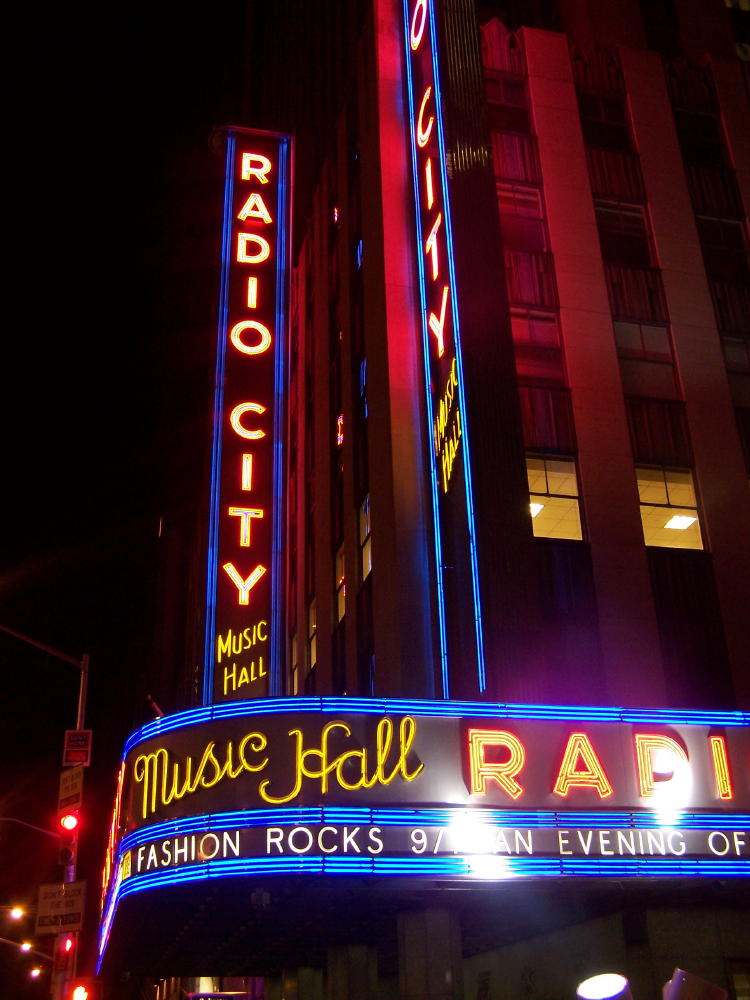 The bright lights of Radio City Hall at night.