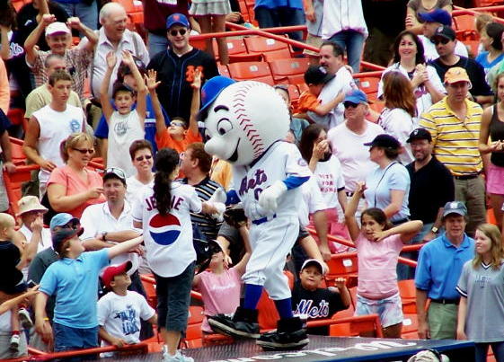 Mr. Met is being himself on top of the Mets' dugout.