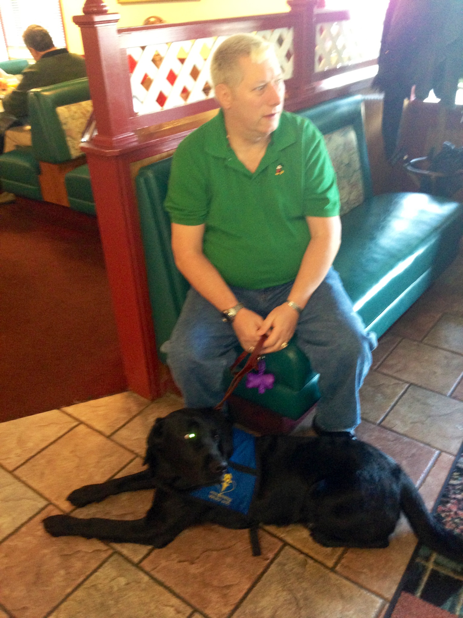 The service is being a good and waiting to be seated with us for breakfast at a local restuarant.